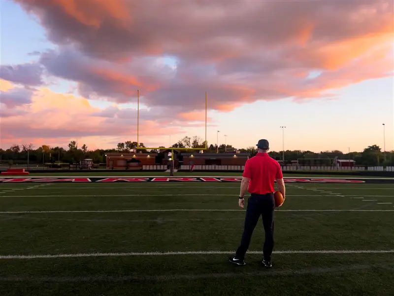 Coach facing the endzone on the field